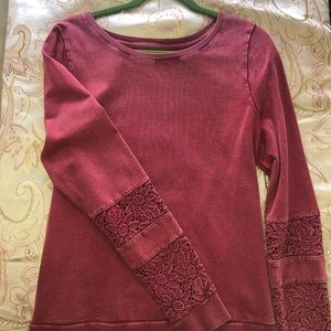 Red sweater with detailed sleeves